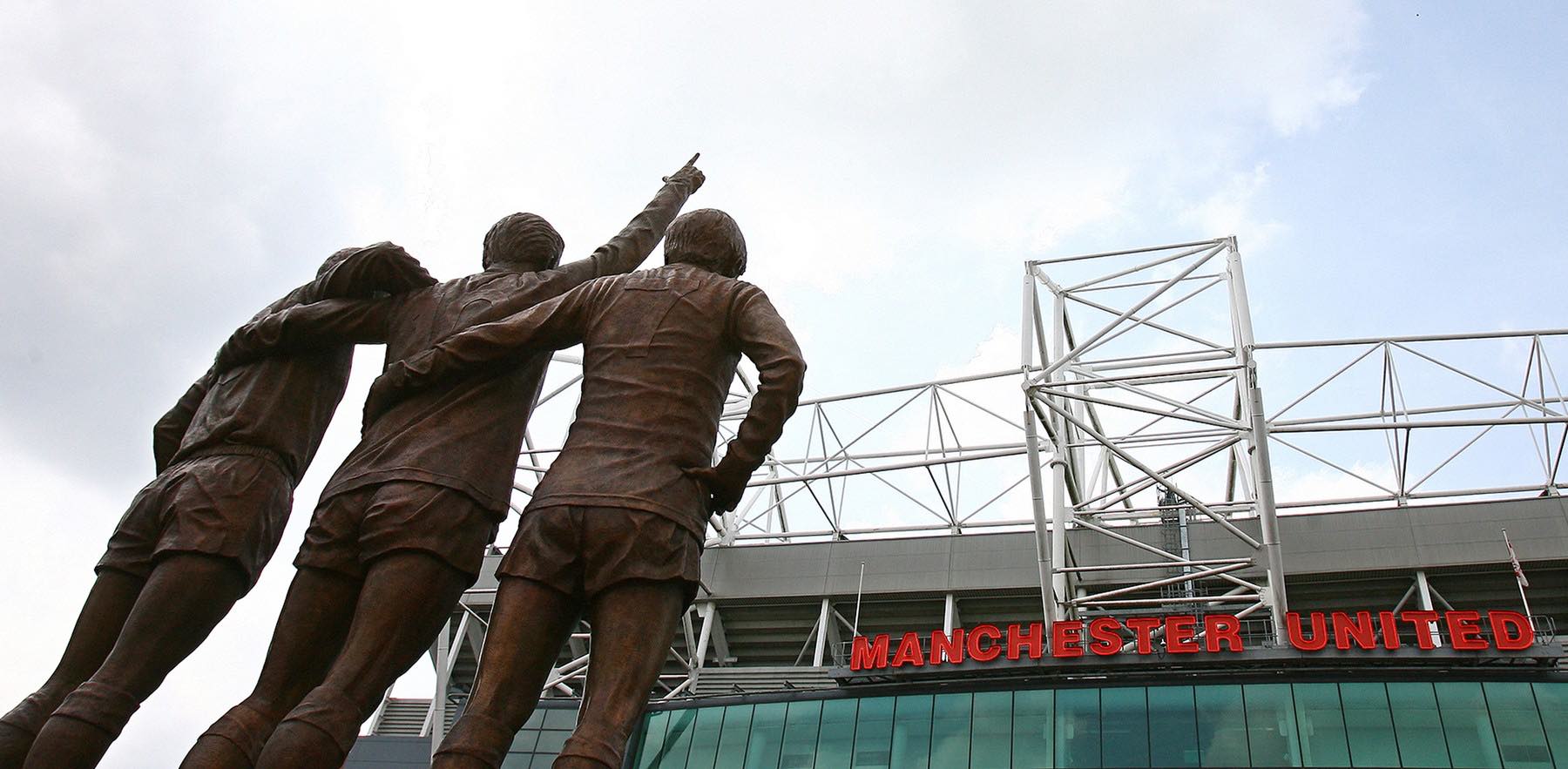 The bronze statue of the 'Busby Babes' features George Best, Dennis Law and Bobby Charlton