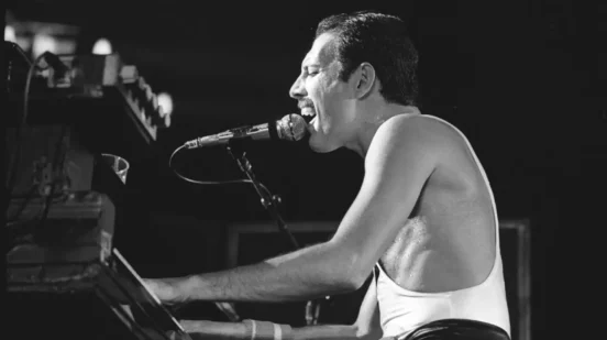 Freddie Queen playing piano