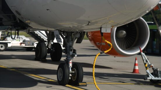 a maintenace work on a plane at an airport