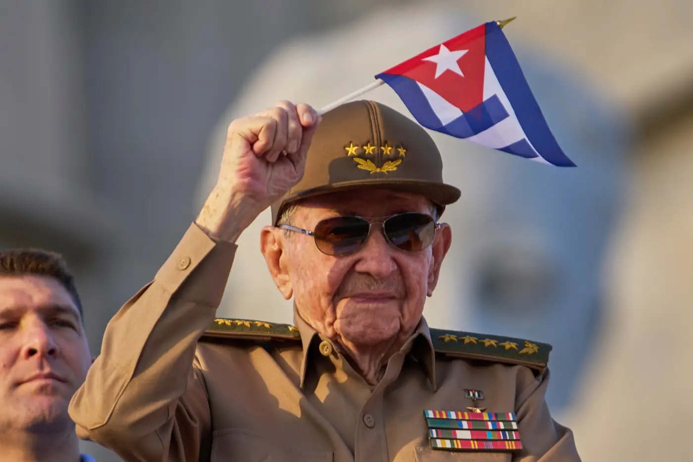 Raul Castro waves a Cuban flag