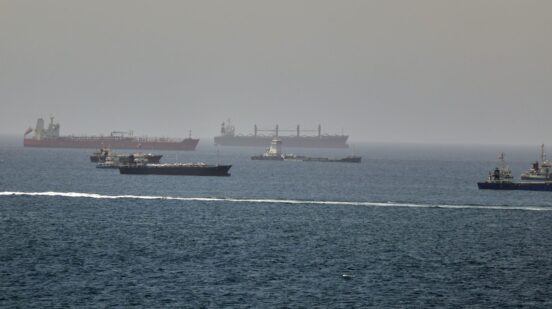 Tankers and cargo vessels are seen in the Gulf of Oman, along shipping routes linking the Strait of Hormuz and the Arabian Sea, Tuesday, June 16, 2026. (AP Photo)
