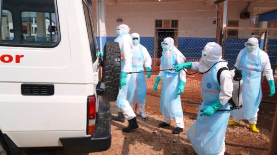 Health workers disinfects an ambulance at Ebola Treatment Center at Bunia General Hospital in Ituri, Congo, Wednesday, July 22, 2026. (AP Photo/Dirole Lotsima Dieudonne)