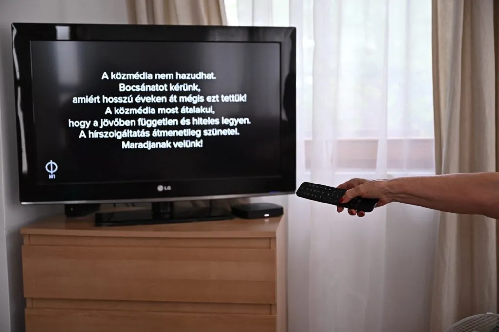 A message can be read on a tv screen at a family home in Agard, Hungary on July 7, 2026, as the main state channel, the M1 informs viewers of the temporary suspension of news broadcasts in all state broadcasters. Message reads - 'The public state media cannot lie. We apologize for doing this for so many years! The public media is now transforming itself to be independent and credible in the future. News service is temporarily suspended! Stay tuned!). Two Hungarian public broadcasters close to Viktor Orban have halted broadcasting as part of efforts to undo the longtime nationalist leader's hold on the media, Prime Minister Peter Magyar said on July 7, 2026. "A historic day. Today marks the end of propaganda broadcasts on public media platforms," Magyar, who ousted Orban as prime minister in April, said on Facebook.,Image: 1115058171, License: Rights-managed, Restrictions: , Model Release: no , Credit line: Attila KISBENEDEK / AFP / Profimedia