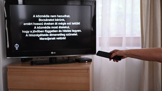 A message can be read on a tv screen at a family home in Agard, Hungary on July 7, 2026, as the main state channel, the M1 informs viewers of the temporary suspension of news broadcasts in all state broadcasters. Message reads - 'The public state media cannot lie. We apologize for doing this for so many years! The public media is now transforming itself to be independent and credible in the future. News service is temporarily suspended! Stay tuned!). Two Hungarian public broadcasters close to Viktor Orban have halted broadcasting as part of efforts to undo the longtime nationalist leader's hold on the media, Prime Minister Peter Magyar said on July 7, 2026.